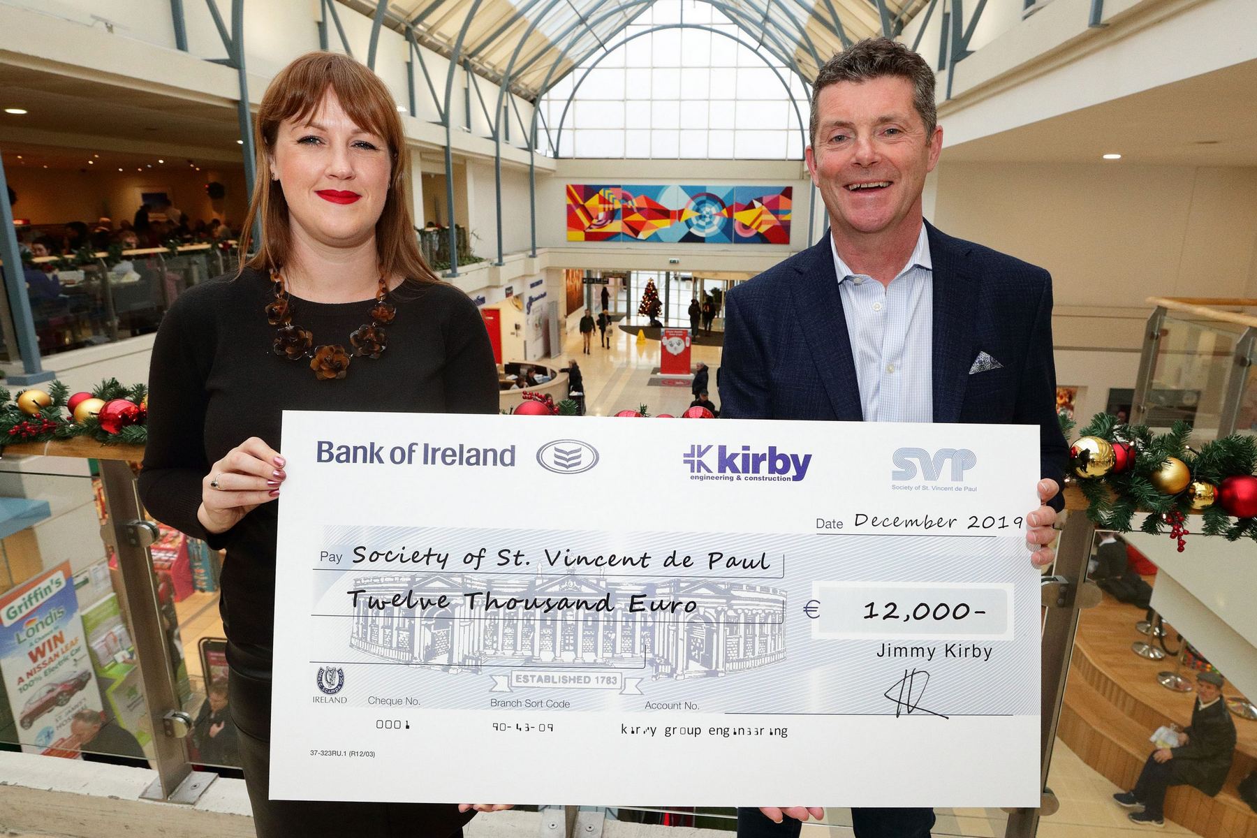 Jimmy Kirby, Kirby Group Managing Director presents €12,000 donation to Deirdre Mullen, SVP