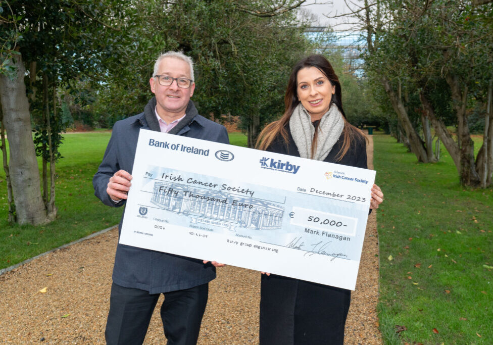 Kirby Group Managing Director, Mark Flanagan, presents Alison Reynolds, Corporate Partnerships Officer, from the Irish Cancer Society, with a Christmas donation cheque for €50,000.